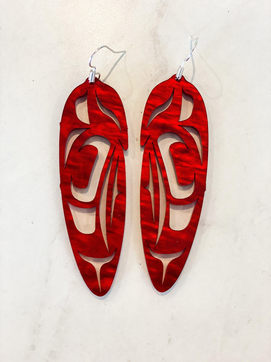 Close up of feather earrings by indigenous artist acrylic 7