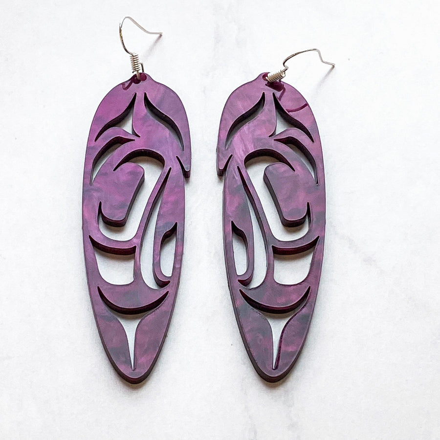 Close up of feather earrings by indigenous artist acrylic 8