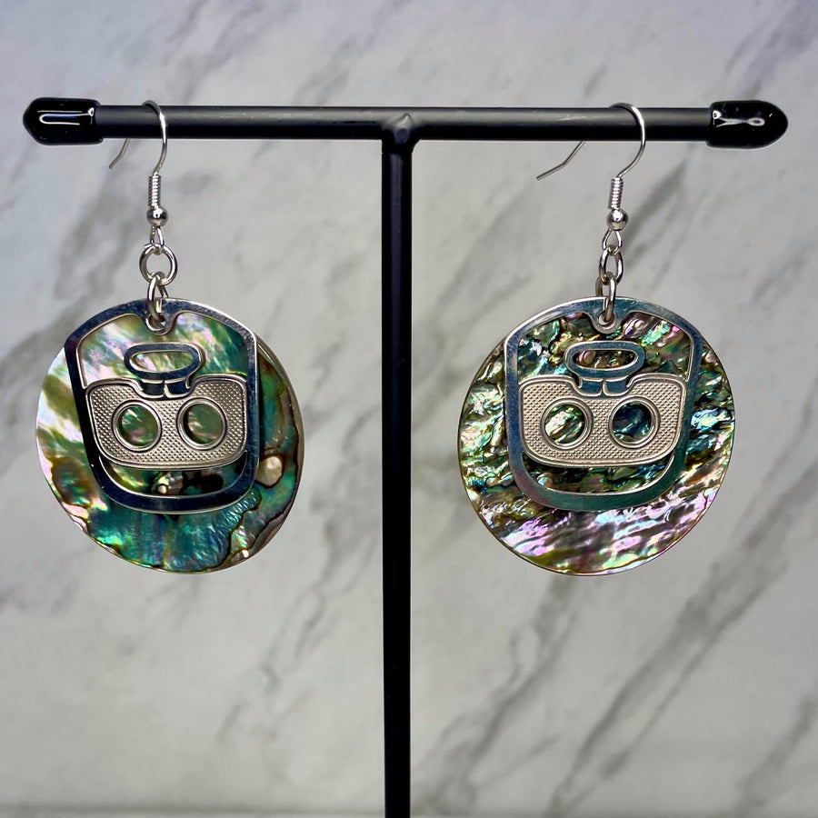 Close up up of ghost face earrings by indigenous artist abalone and silver 3