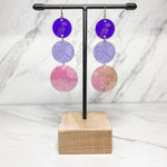 Close up of medicine collection earrings by indigenous artist acrylic