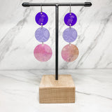 Close up of medicine collection earrings by indigenous artist acrylic