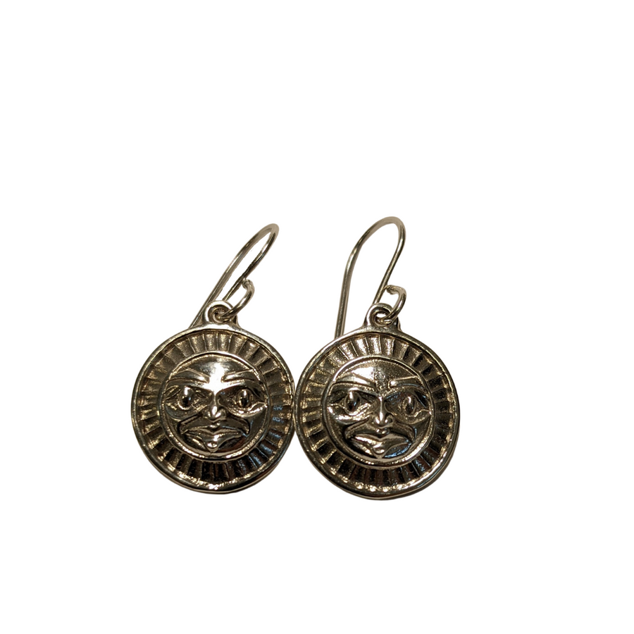 Close up of earrings silver moon or sun by indigenous artist 2