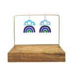 Close up of pride rainbow earrings by indigenous artist acrylic
