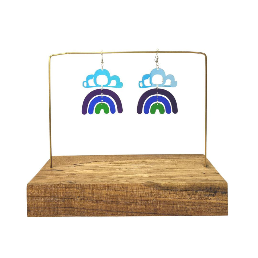 Close up of pride rainbow earrings by indigenous artist acrylic