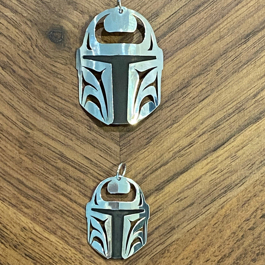 Close up of Protector pendant by indigenous artist sterling silver or brass