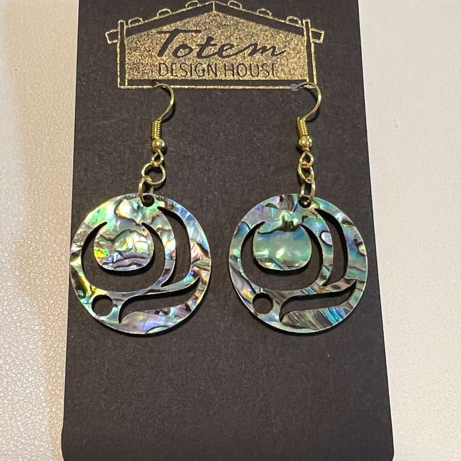 Close up up of salmon trout head earrings by indigenous artist