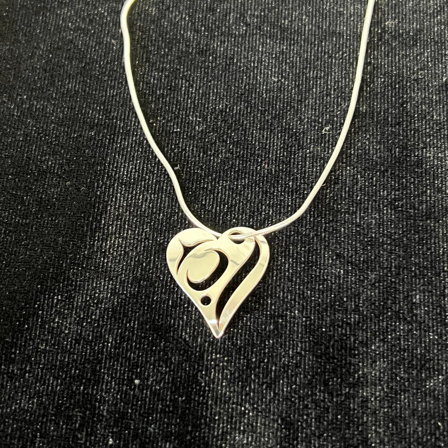 Close up up silver love necklace by indigenous artist 2
