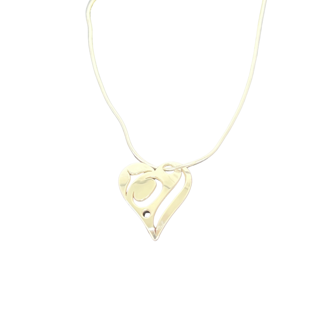 Close up up silver love necklace by indigenous artist