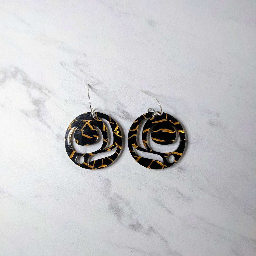 Close up of salmon trout head earrings by indigenous artist acrylic 2