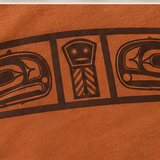 Close-up of the brown ink dowry board print on Texas Orange cotton