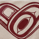 Close-up of the maroon formline heart print on Sand cotton